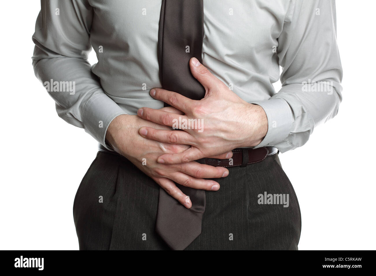 Businessman with stomach ache Stock Photo