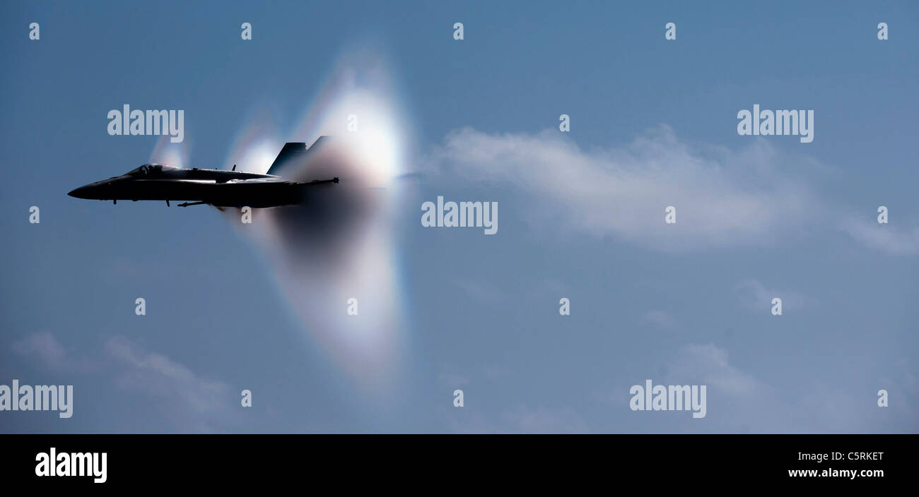 F/A-18E Super Hornet maneuvering breaking the sound barrier F18 F-18 Stock Photo