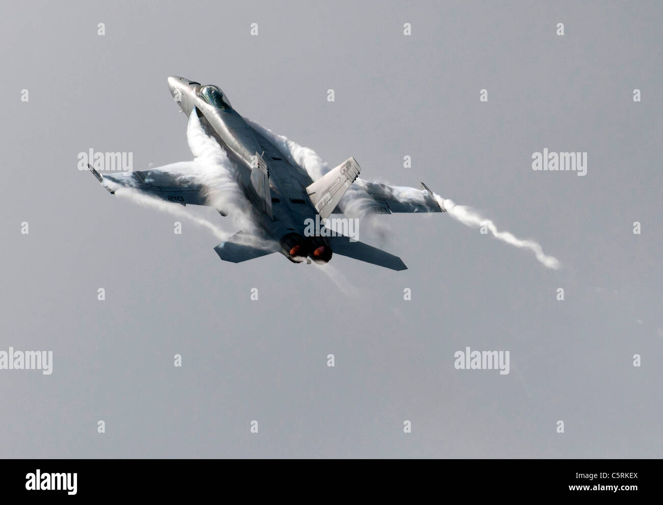 F/A-18E Super Hornet maneuvering breaking the sound barrier F18 F-18 Stock Photo