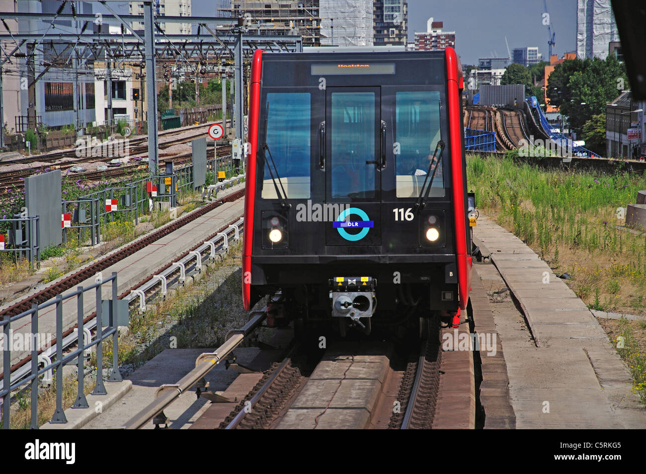 The Docklands Light Railway approaching Tower Gateway Station, Tower Hill, London City, Greater London, England, United Kingdom Stock Photo