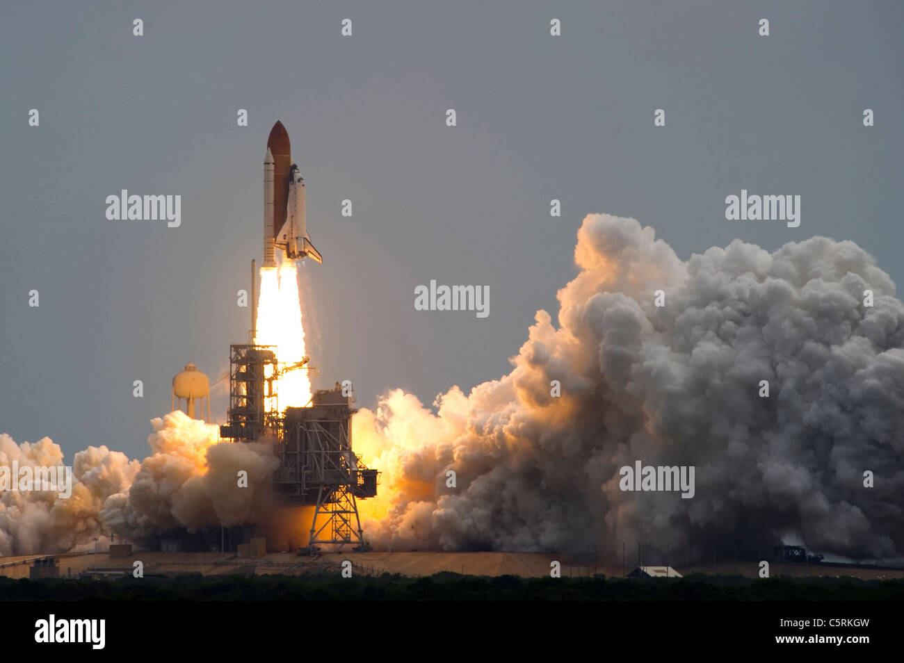 The Space Shuttle Atlantis lifts off from Kennedy Space Center for the last time during NASA's final space shuttle mission. Stock Photo