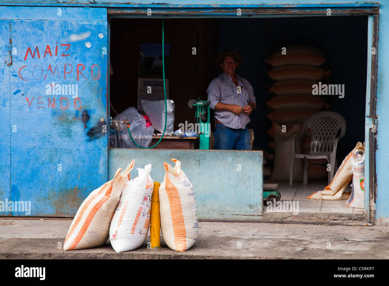 Man selling sacks of corn near San Salvador, El Salvador Stock Photo