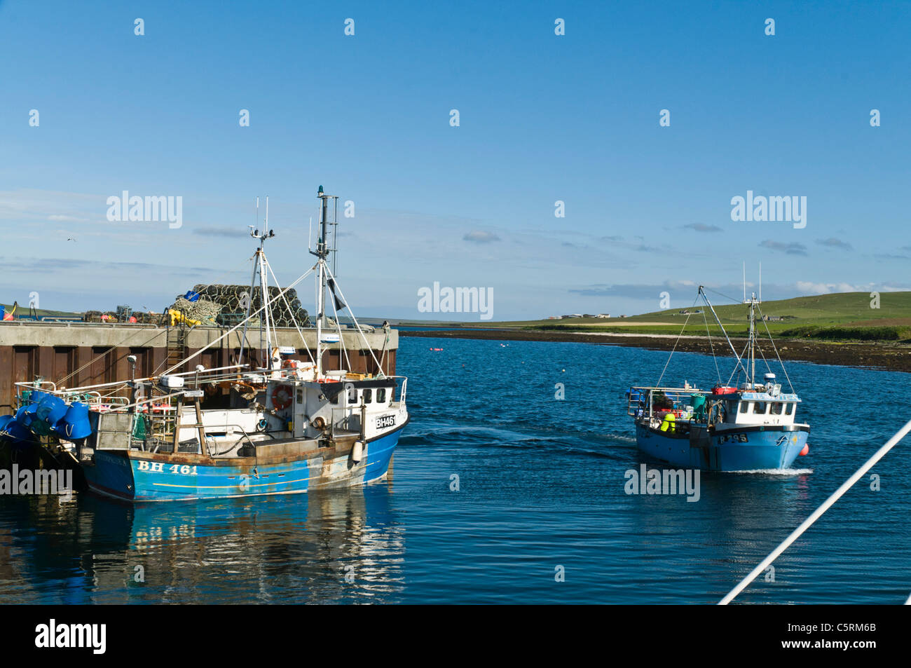 dh Tingwall harbour RENDALL ORKNEY Fishing crab boat arriving in harbour fisherman uk Stock Photo