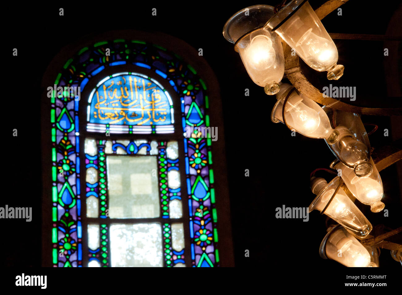 Lightbulbs and a stained glass window, Ayasofya (Hagia Sophia) cathedral and mosque, Istanbul, Turkey Stock Photo