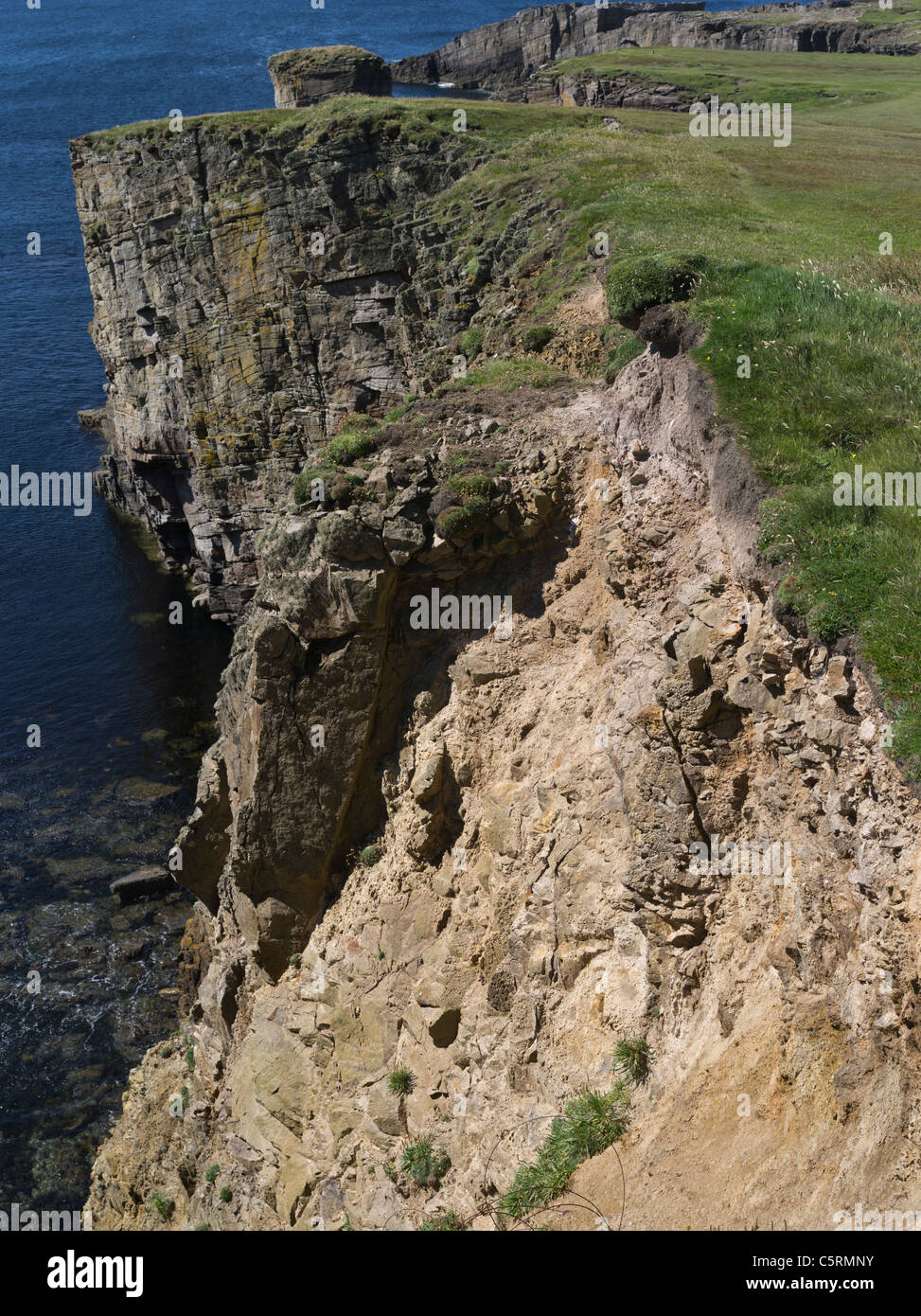 dh  COASTAL EROSION UK Sea cliff coasts erosion Orkney coast scottish subsides scotland Stock Photo