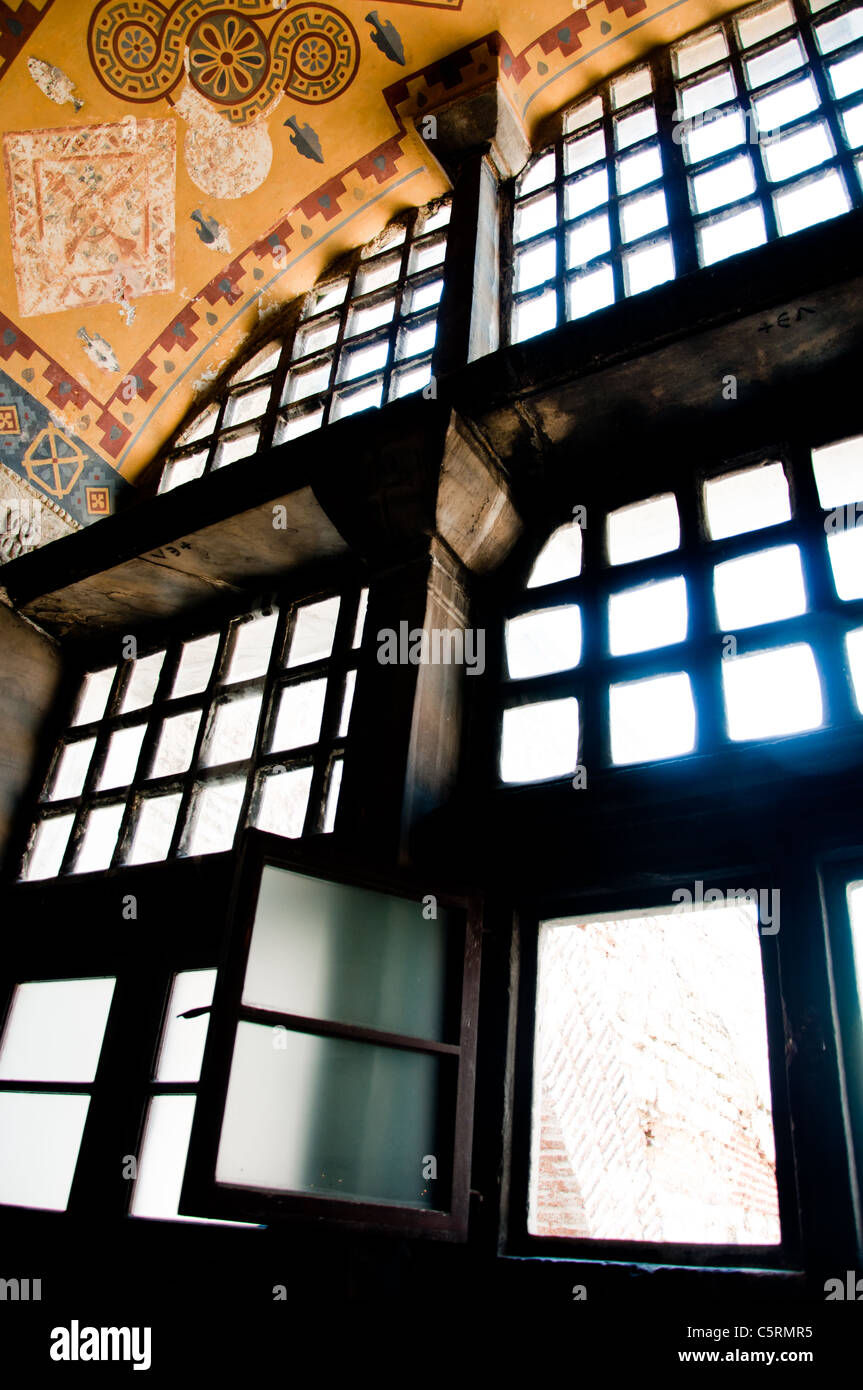 Faded ancient painting and a window, Ayasofya (Hagia Sophia) cathedral and mosque, Istanbul, Turkey Stock Photo