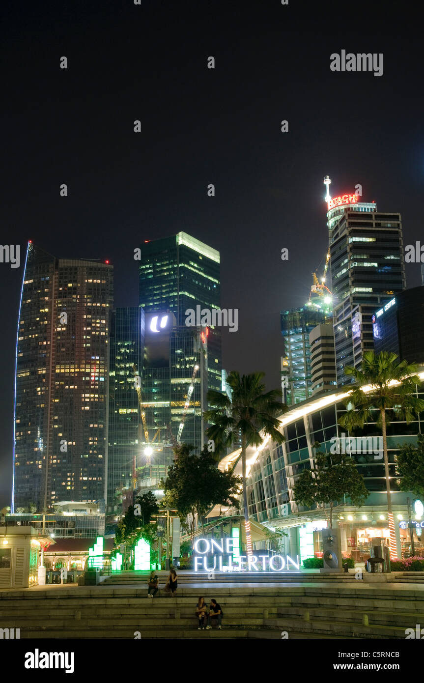 Amusement strip One Fullerton at Marina Bay at night, skyscrapers of financial district, Singapore, Southeast Asia, Asia Stock Photo