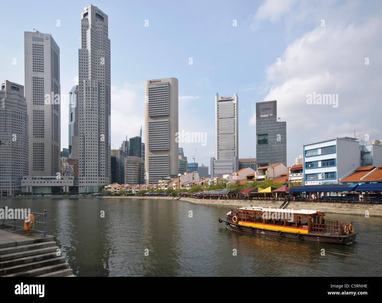 Old and modern architecture, Boat Quay at Singapore River with skyscrapers of financial district, Singapore, Southeast Asia Stock Photo