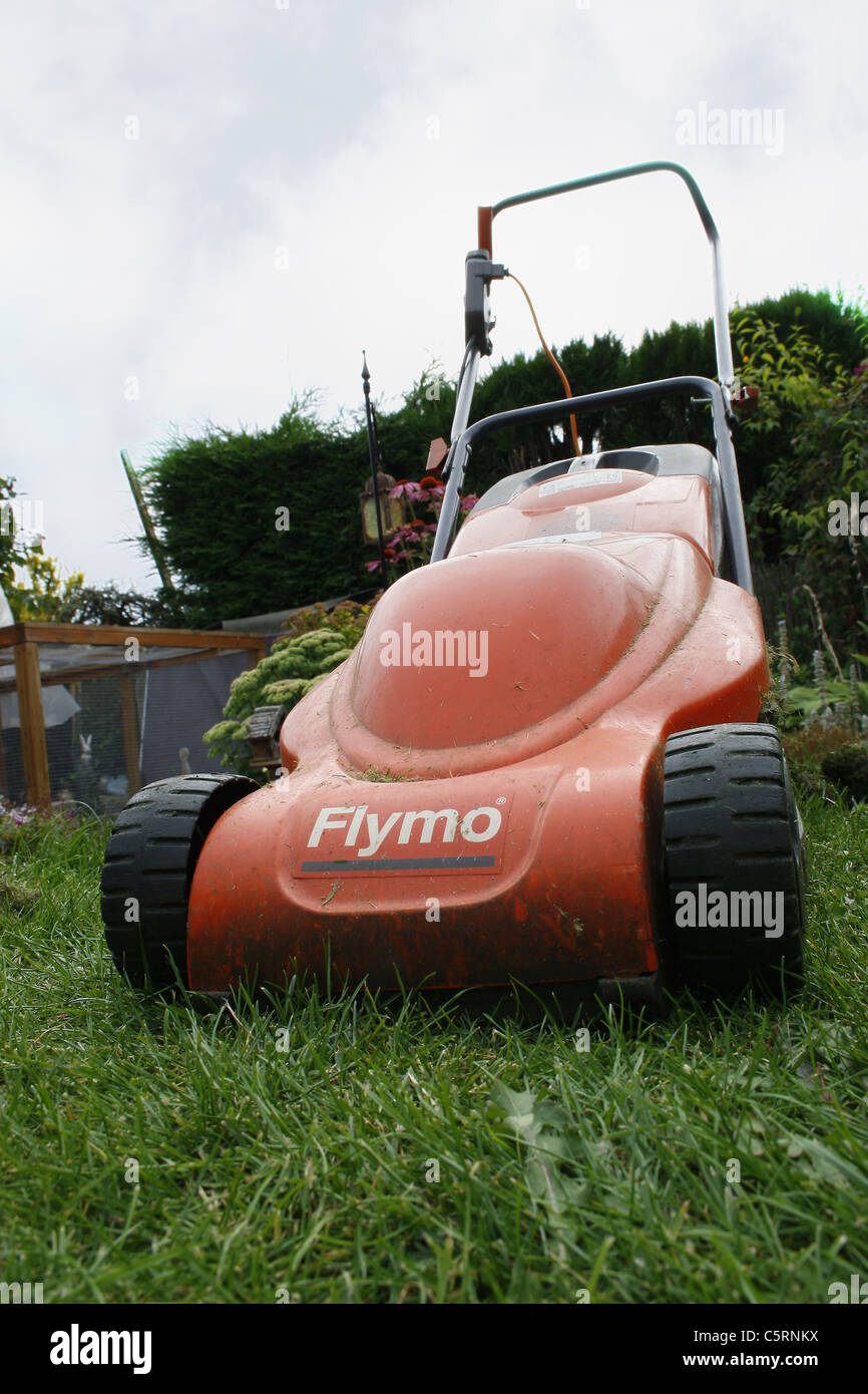 flymo lawnmower on grass. Worksop, Notts, England Stock Photo