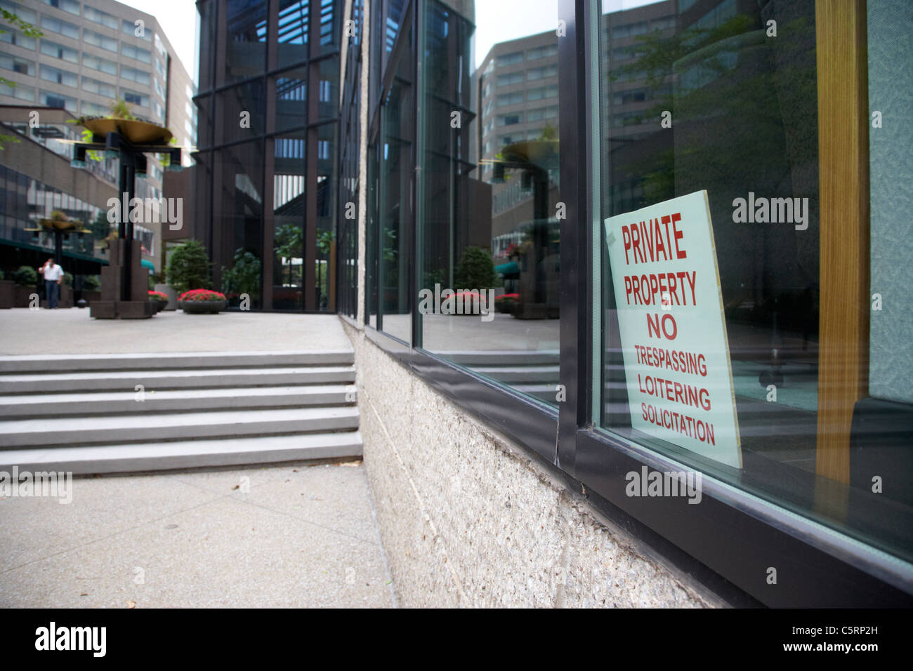 Private property no trespassing loitering solicitation sign in bank of america plaza in the financial district Nashville Tenness Stock Photo