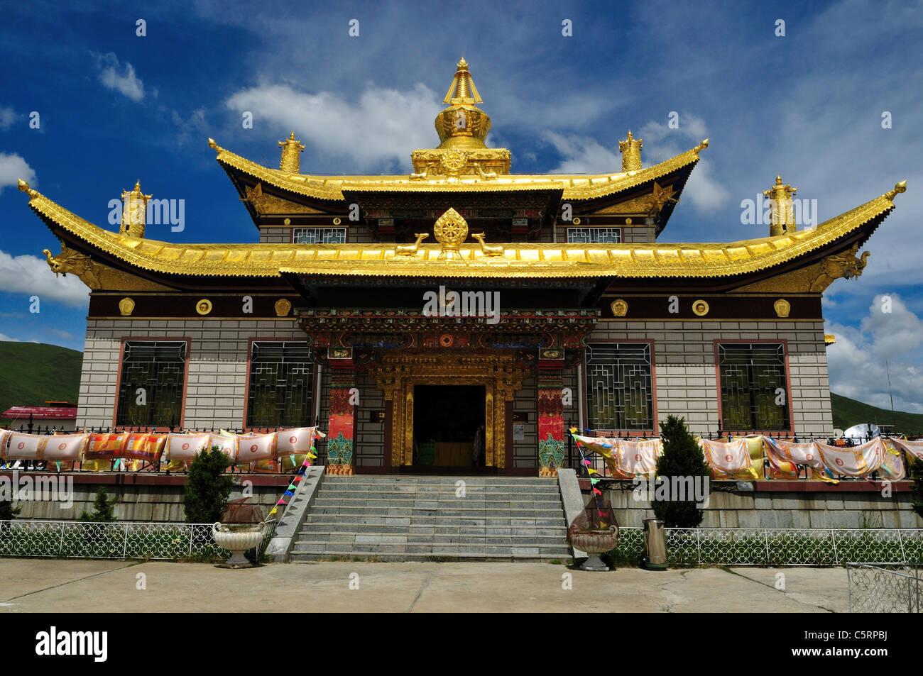 Tibetan Buddhist temple with golden roof. Tagong, Sichuan, China. Stock Photo