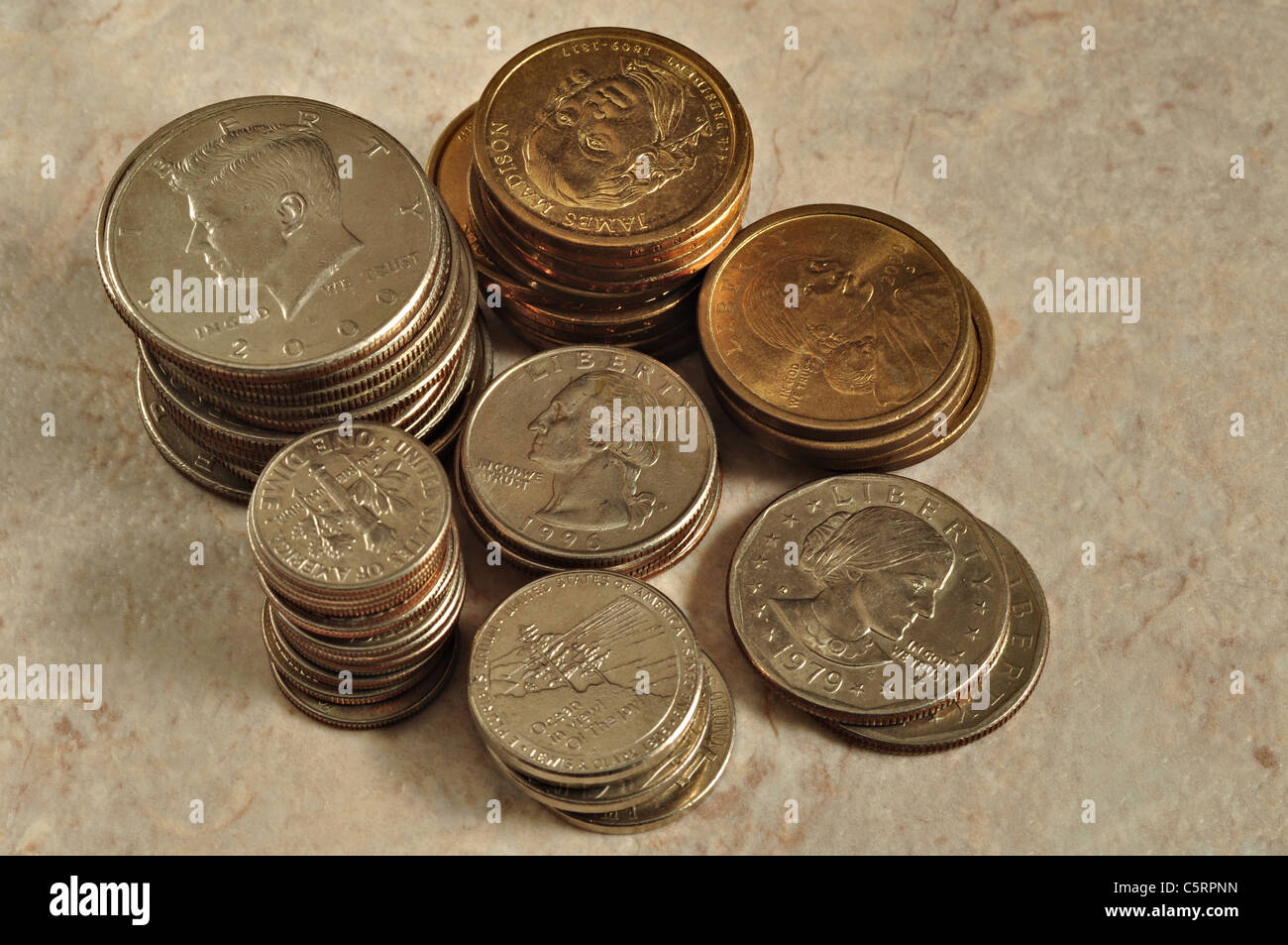 A photo of a collection of different American coins Stock Photo