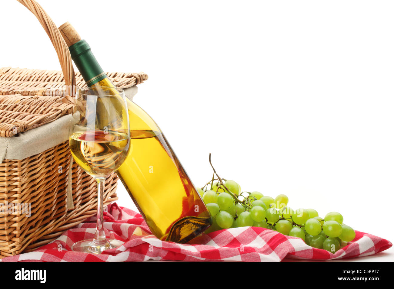 picnic basket with grapes and wine. Stock Photo