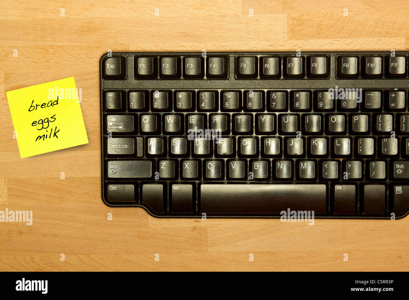A computer keyboard on an office desk Stock Photo Alamy