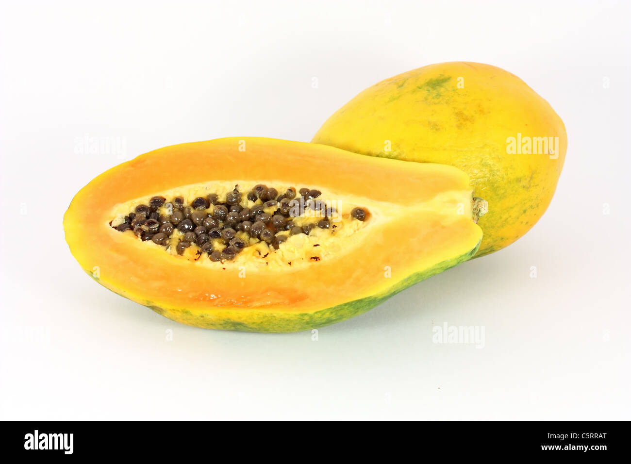 Ripe papaya fruit isolated on white background Stock Photo Alamy
