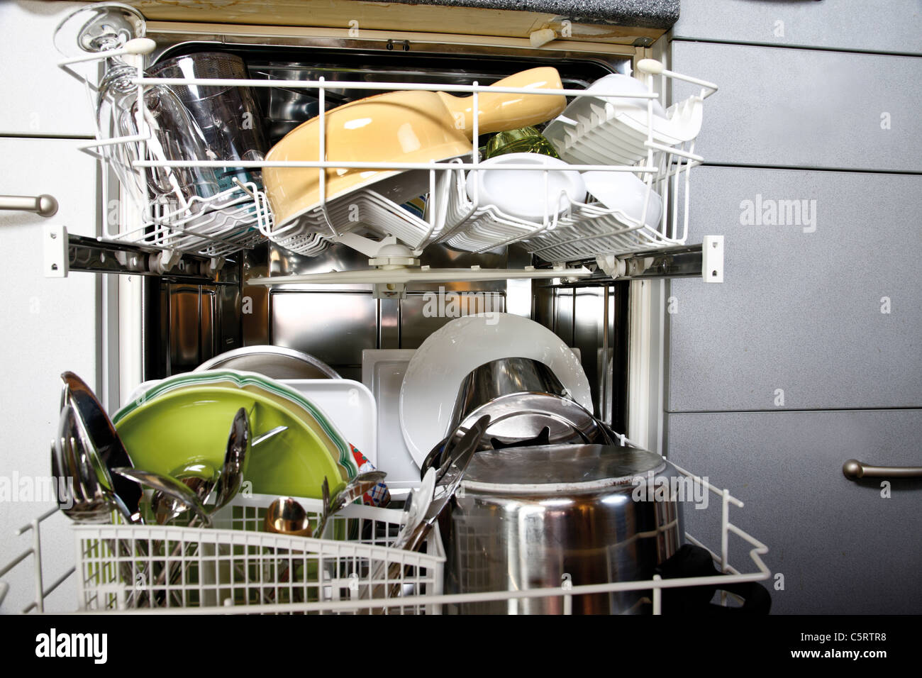 Cleaned dishes in open dishwasher, closeup Stock Photo Alamy