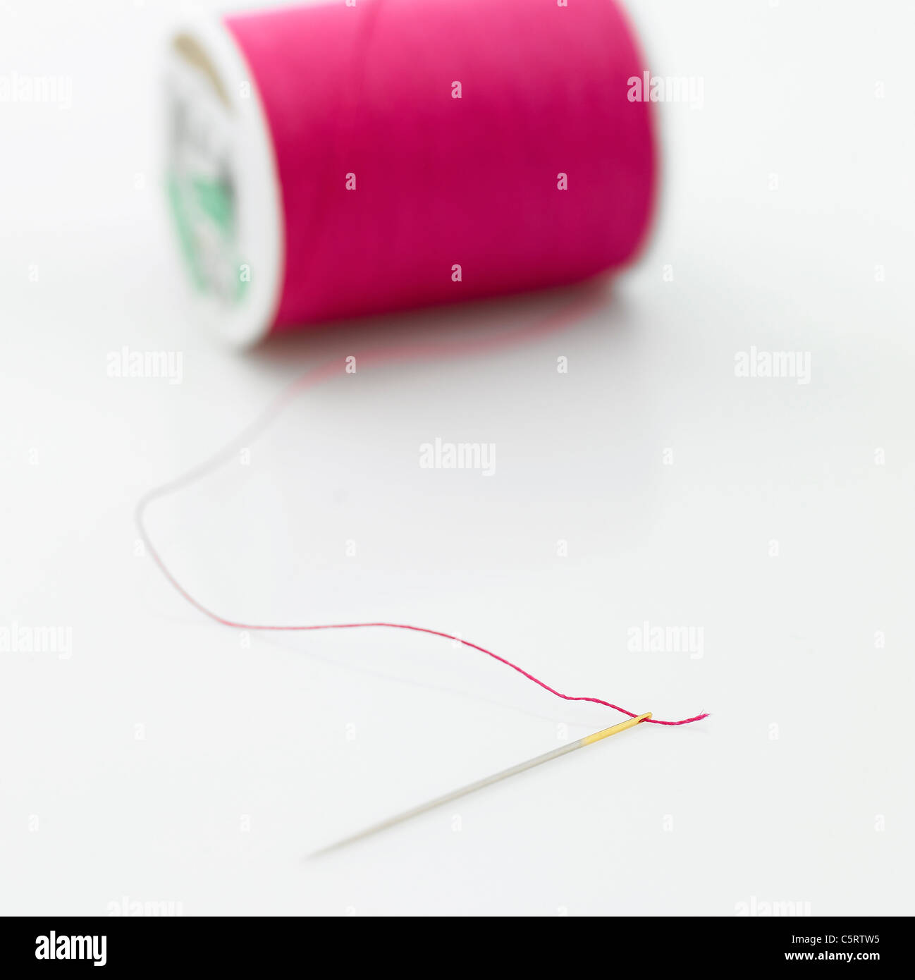 Needle and thread hi-res stock photography and images - Alamy