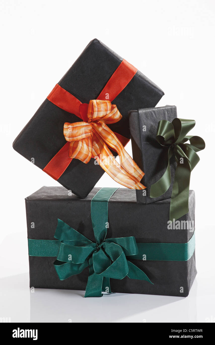 Gifts wrapped with green wrapping paper Stock Photo