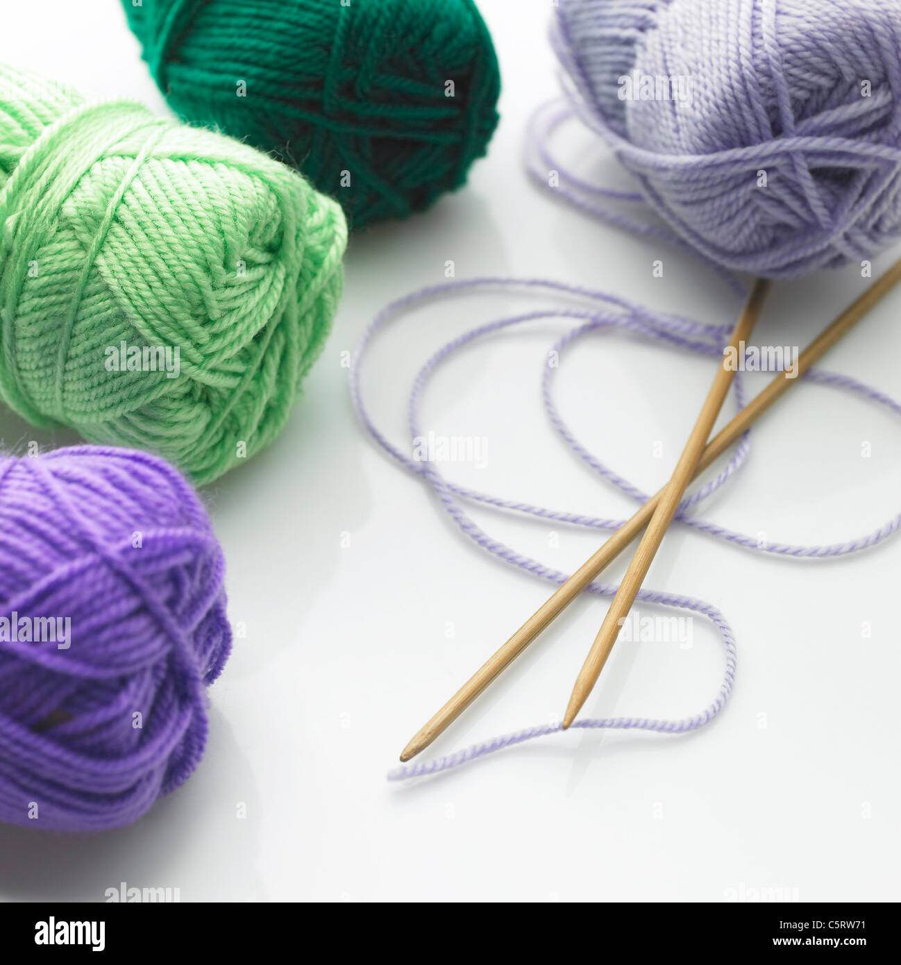 Knitting needle and balls of wool Stock Photo