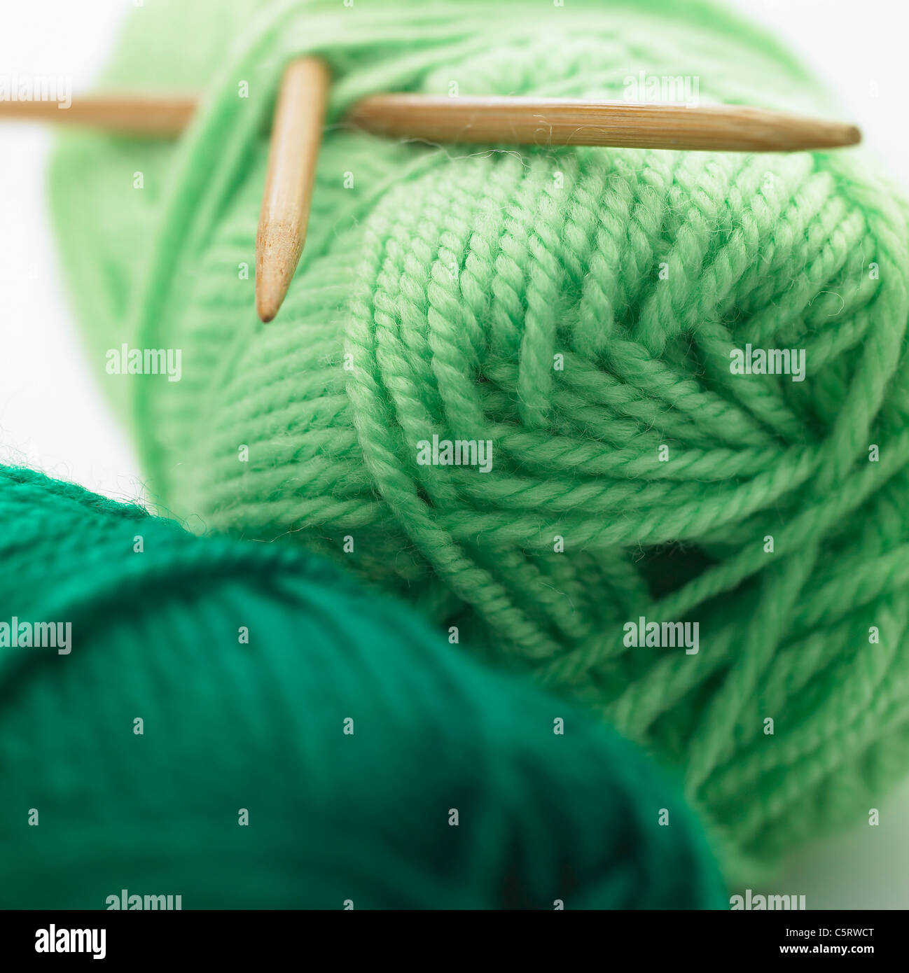 Knitting needle and ball of wool Stock Photo