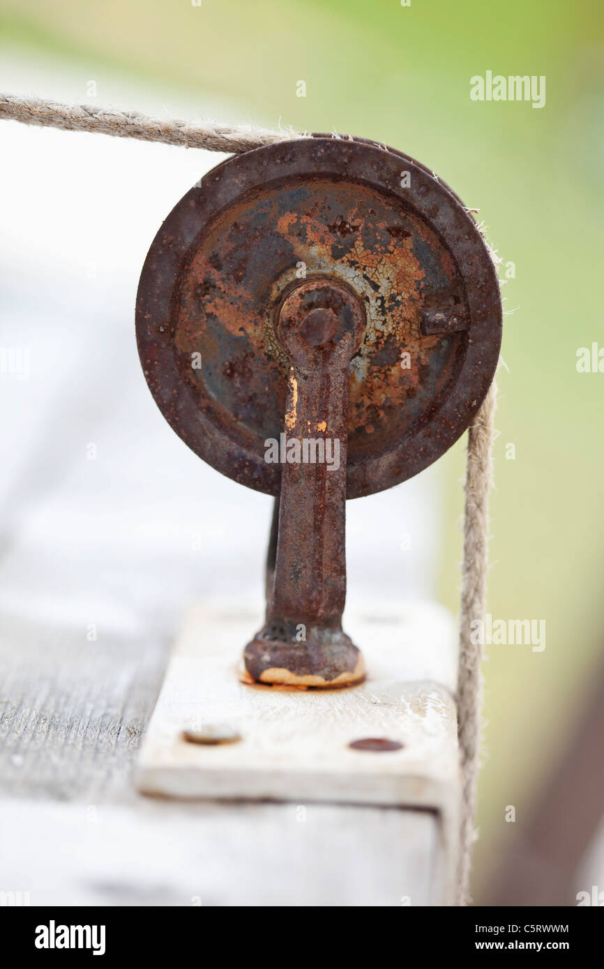 Germany, Close up of rusty cable winch with rope Stock Photo
