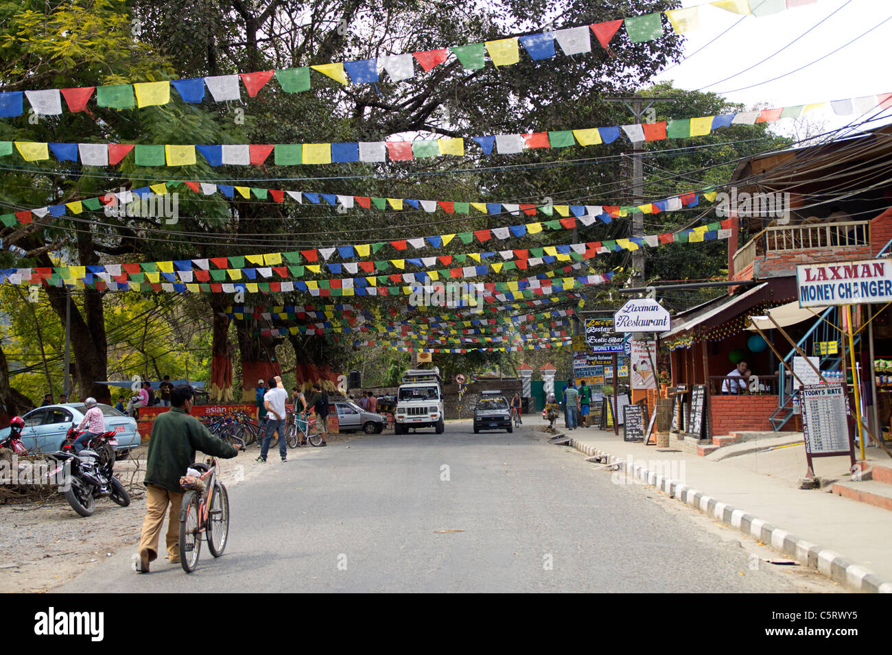 Prayer flags in a street in Pokhara, Western Region, Nepal Stock Photo