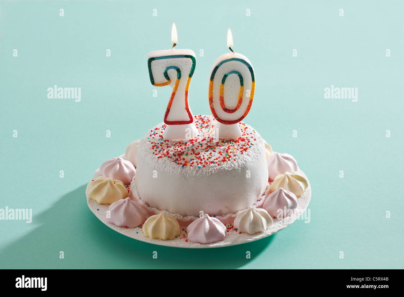 Birthday cake with burning candles Stock Photo - Alamy