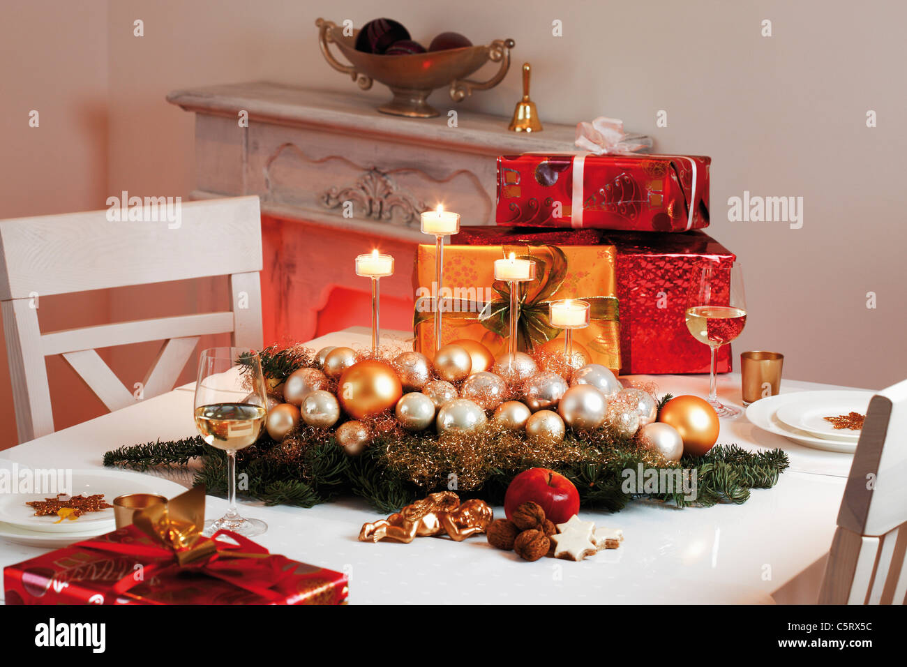 Christmas table decoration and christmas presents Stock Photo