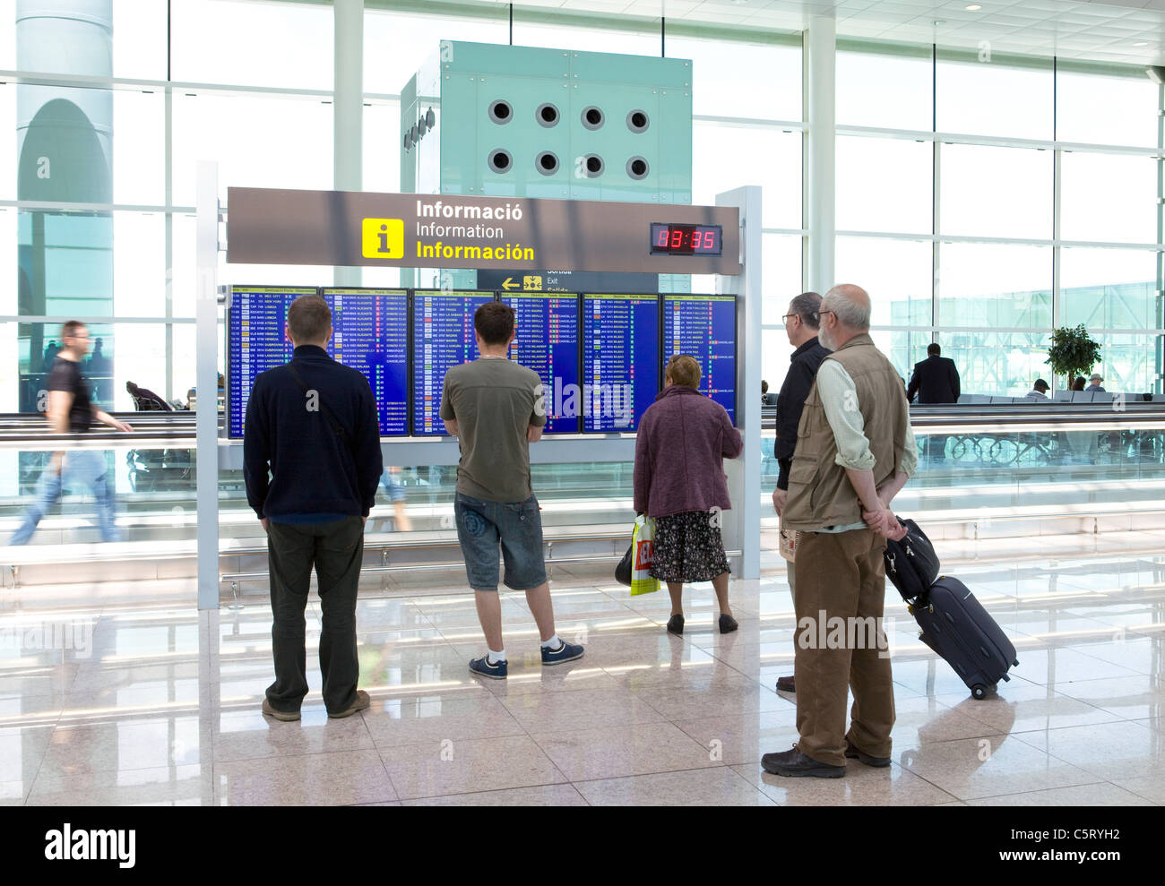 People wait for flight on May 9, 2010 in Barcelona, Spain. Flights are canceled because of volcanic eruption. Stock Photo