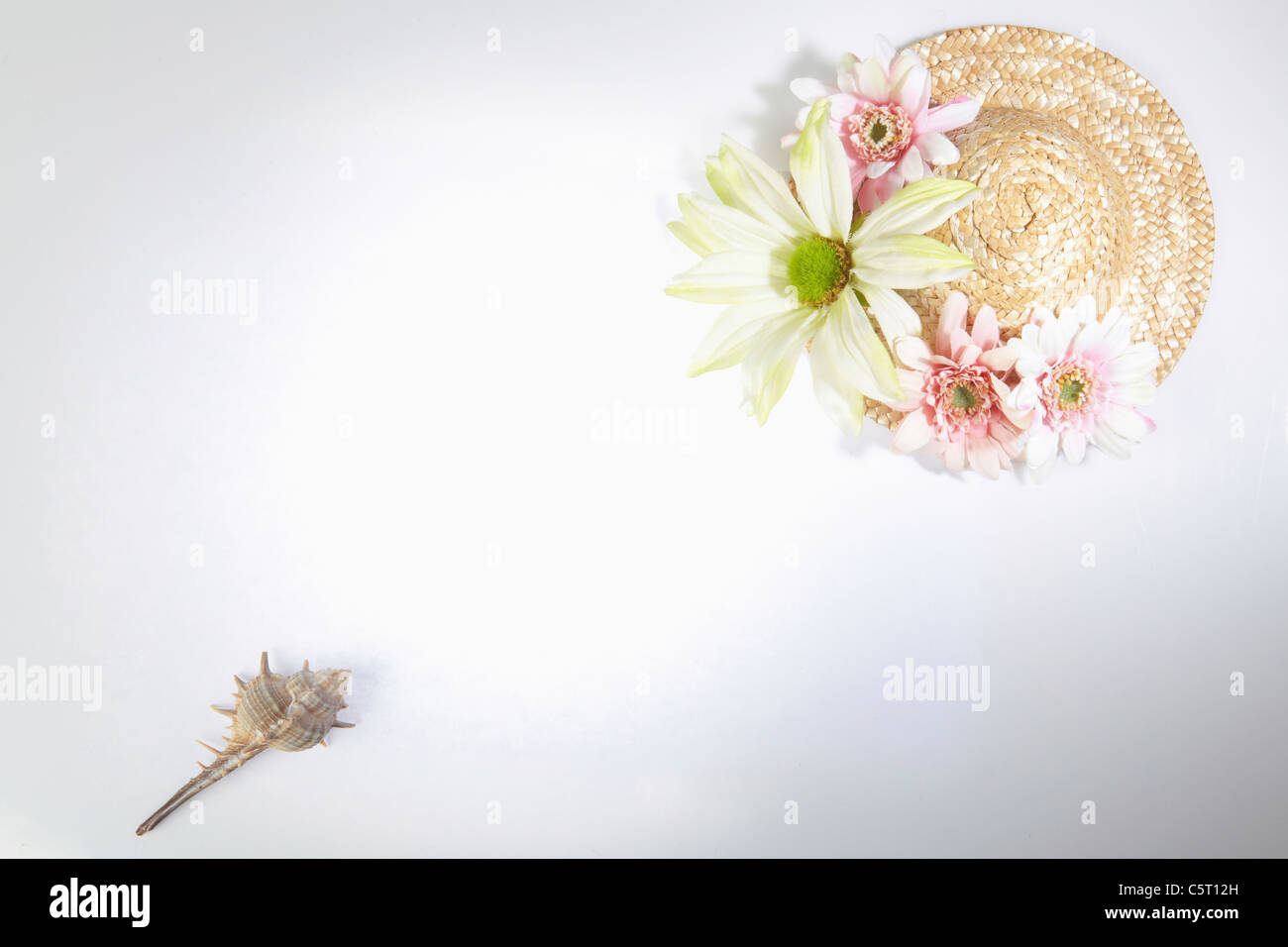 turban shell and hat with flowers Stock Photo