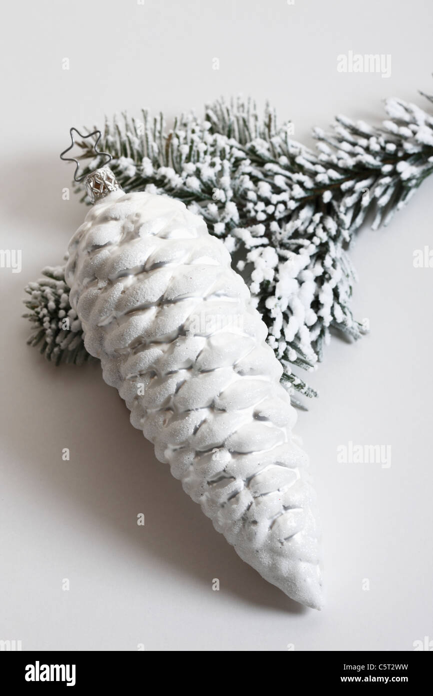 Christmas tree decoration, fir cone and fir branch, close-up Stock Photo
