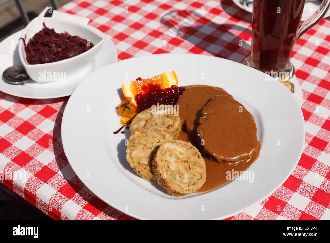 Germany, Bavaria, Franconia, Pottenstein, Close up of marinated beef with dumplings Stock Photo