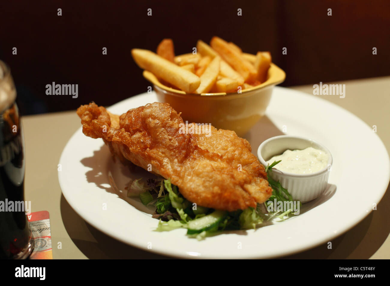 Republic of Ireland, County Fingal, Skerries, Close up of fish and chips in plate Stock Photo