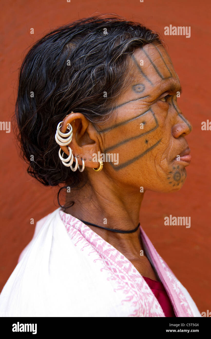 A heavily tattooed face of a tribal women from Baliguda district, Orissa, India Stock Photo