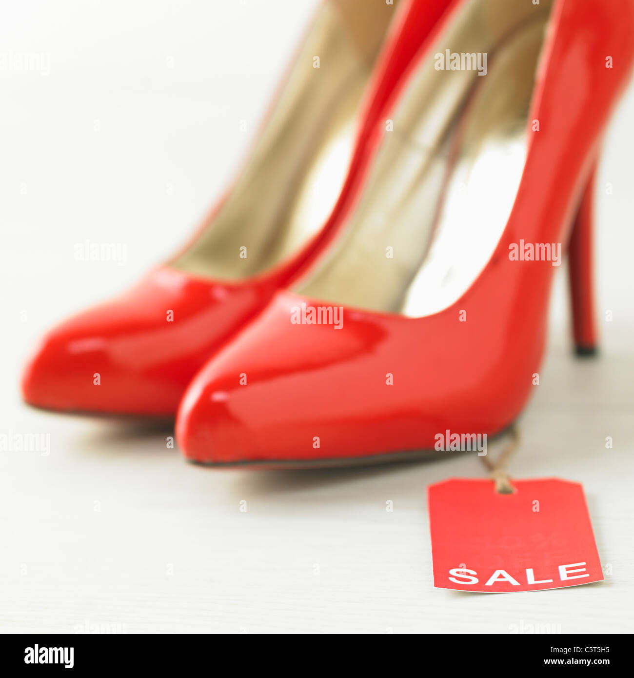 High heels with a tag Stock Photo Alamy
