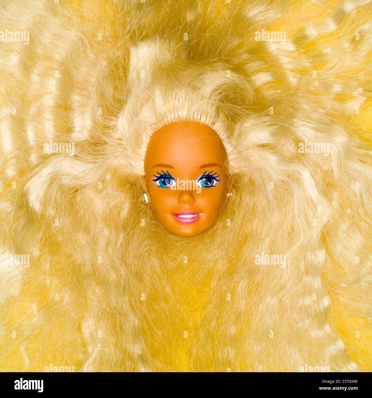 Plastic doll head, elevated view Stock Photo Alamy
