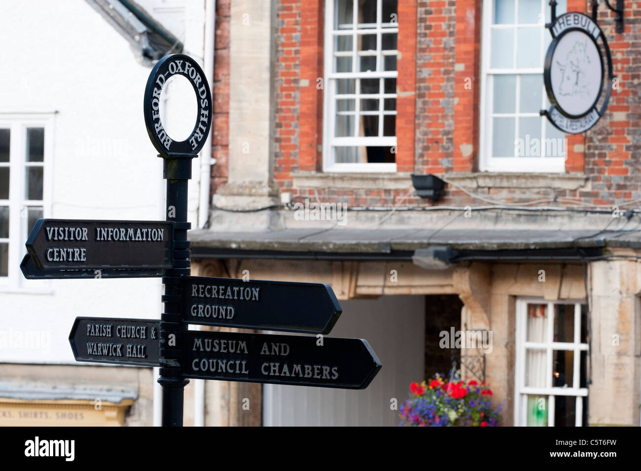 Directional sign in Burford high street. Cotswolds, England Stock Photo