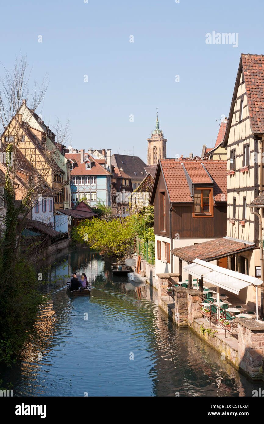 France, Alsace, Colmar, Krutenau, View of La Petite Venise quarter and people in boat at Launch river Stock Photo