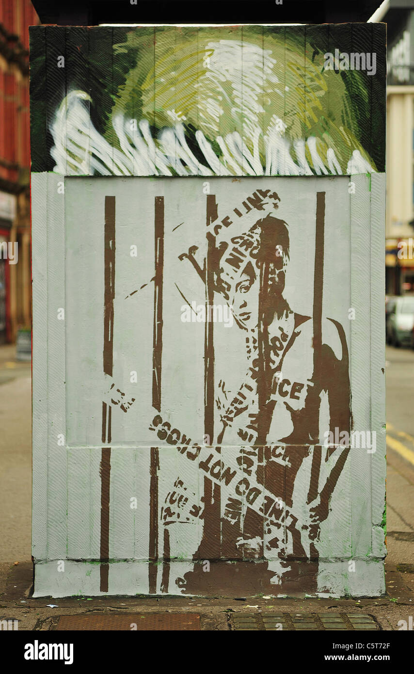 Girl Behind Bars - Street Art Stock Photo