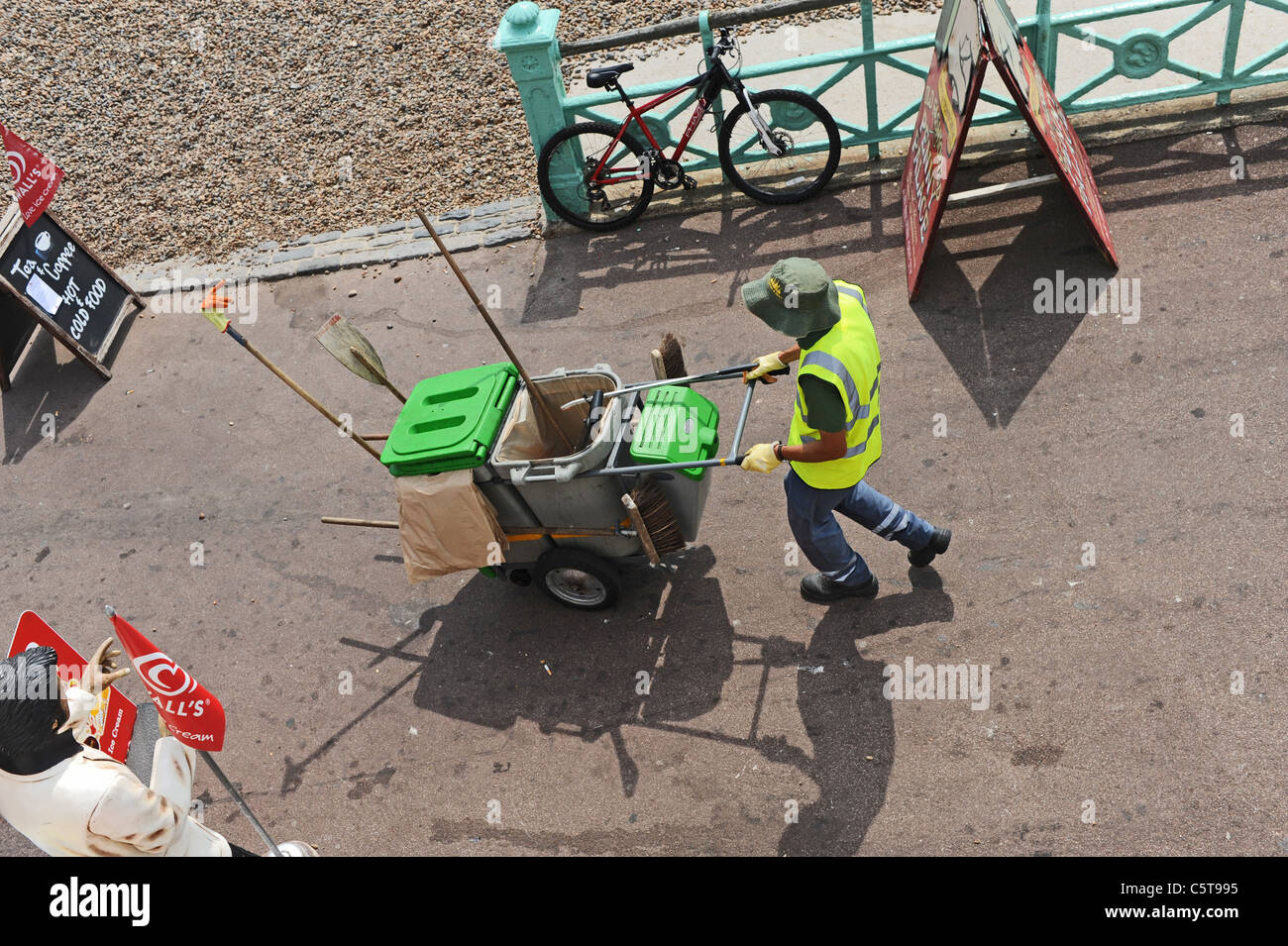 Brighton and Hove city council street cleaner working along the