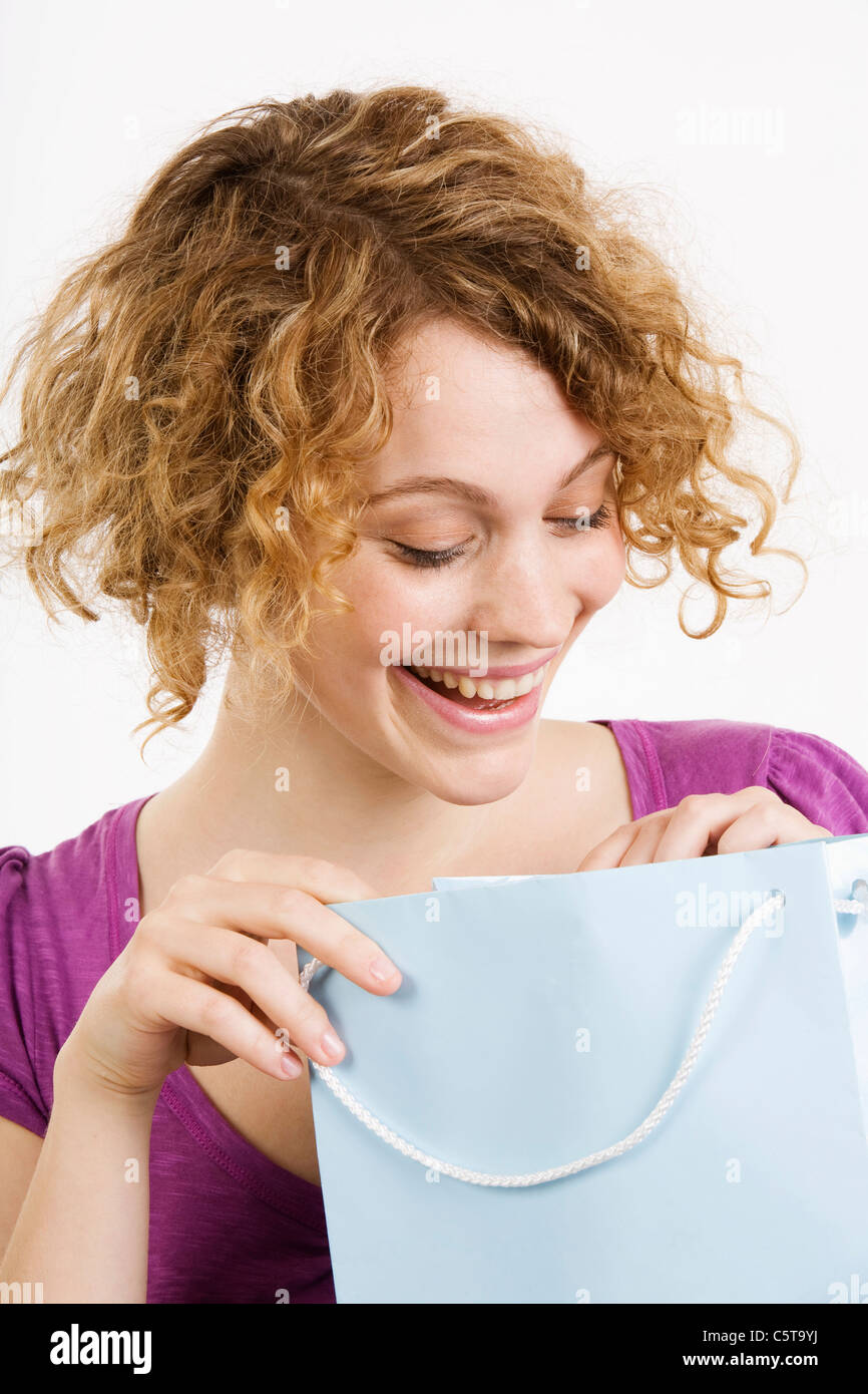 Cheerful curly young woman Cut Out Stock Images & Pictures - Alamy