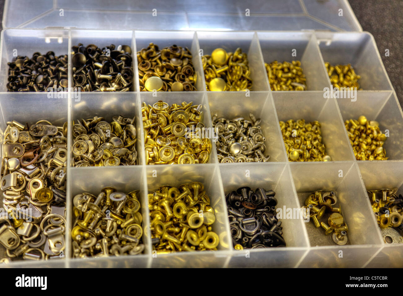 tub rivets and eyelets in a box in different sizes and colours, colors ...