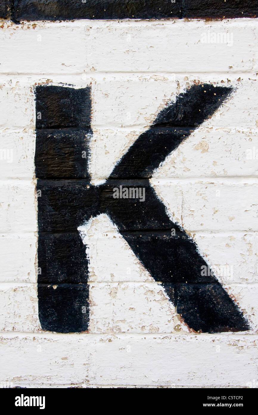 Character K alphabet character letter outside sign Stock Photo - Alamy