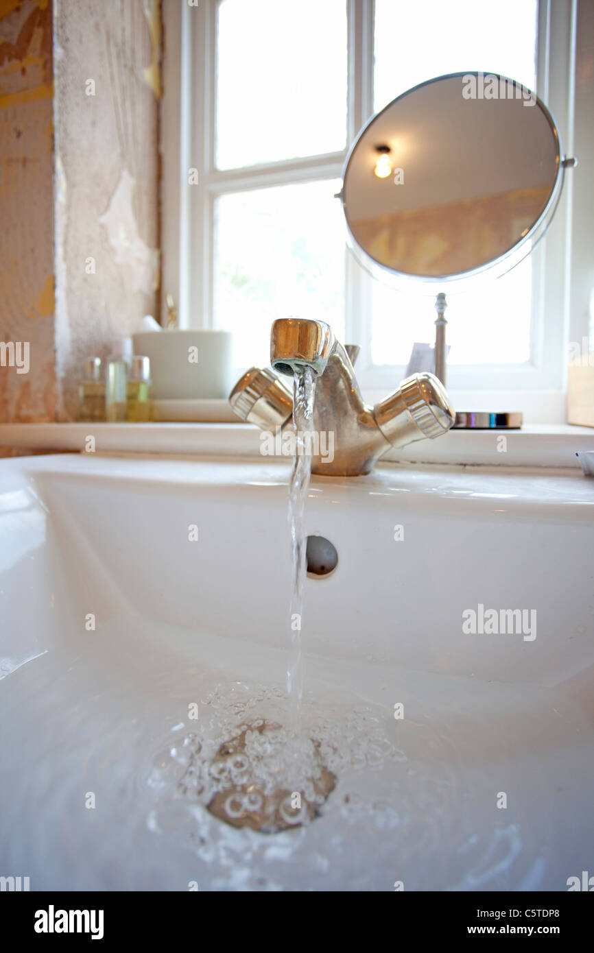 Bathroom Sink Filling Up With Water Stock Photo Alamy