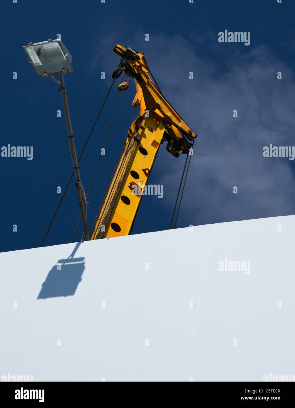 Advertising board and a hoisting crane. Free space to enter text Stock Photo