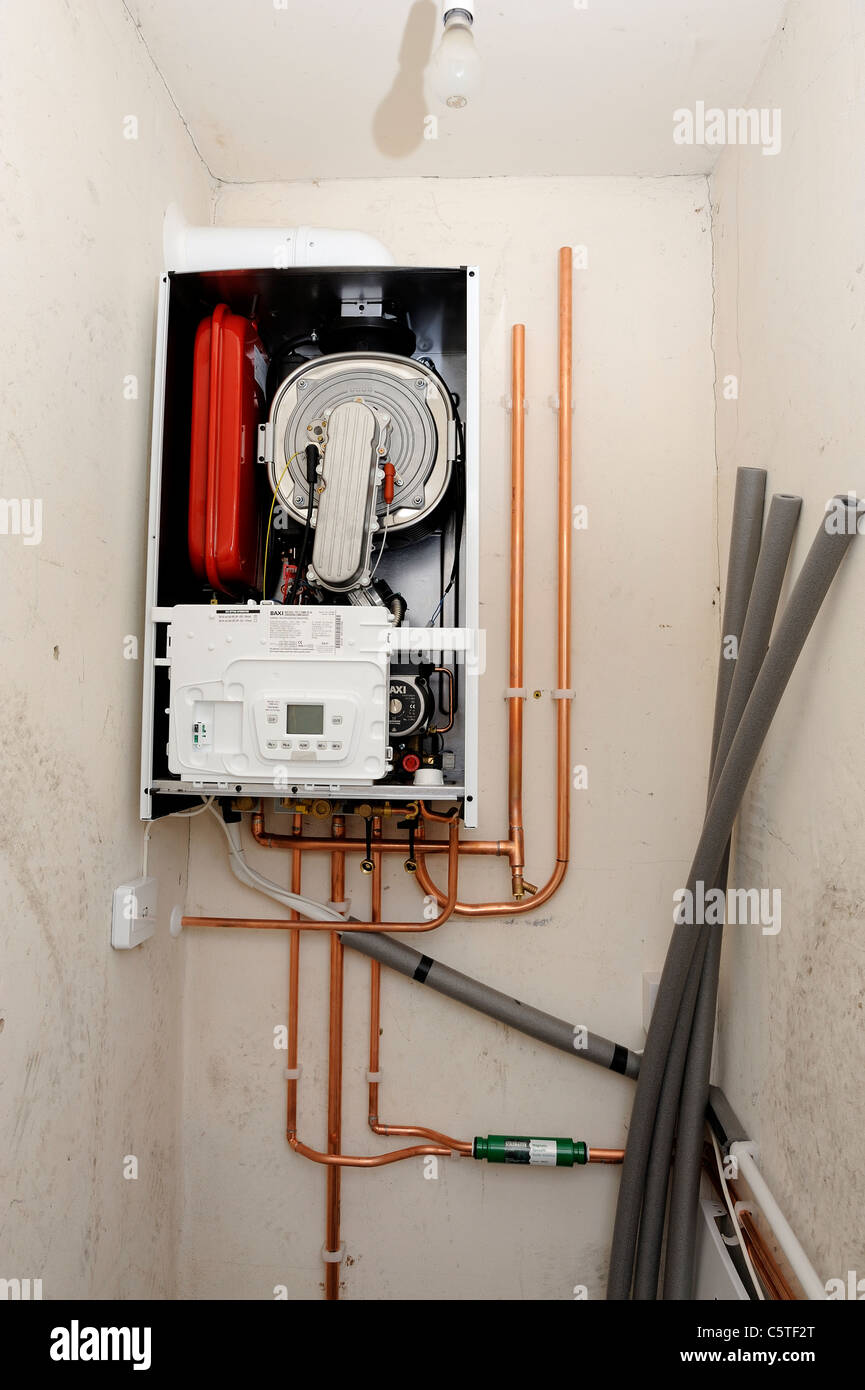 A baxi combi boiler being installed england uk Stock Photo Alamy
