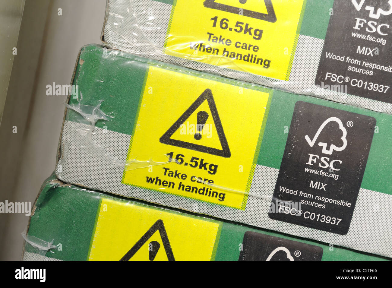 Warning health and safety lifting sign on a wooden flooring box Stock Photo