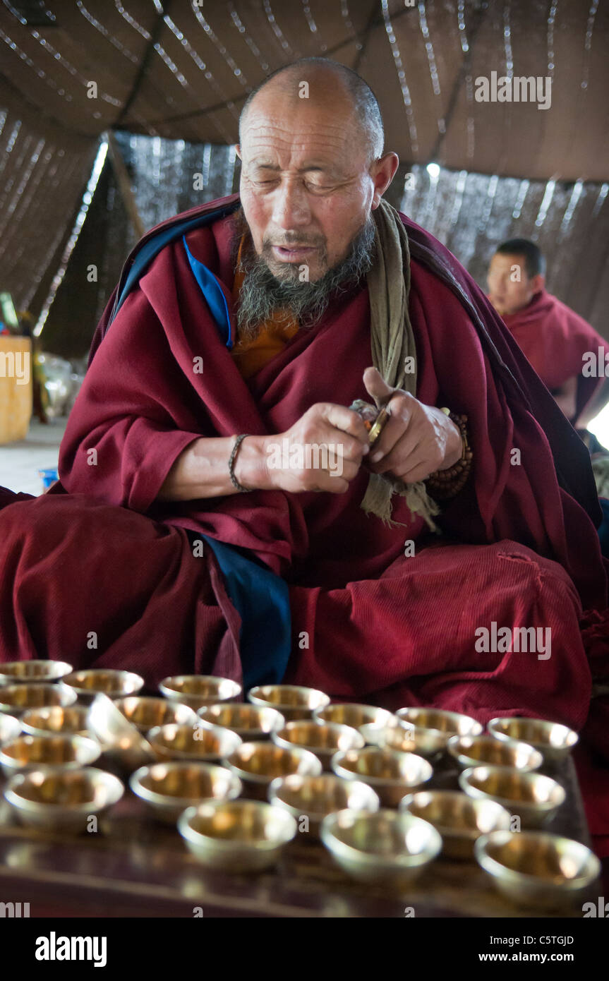 Tibetan Buddhist monk chants during tea ceremony, Arou Ba Temple