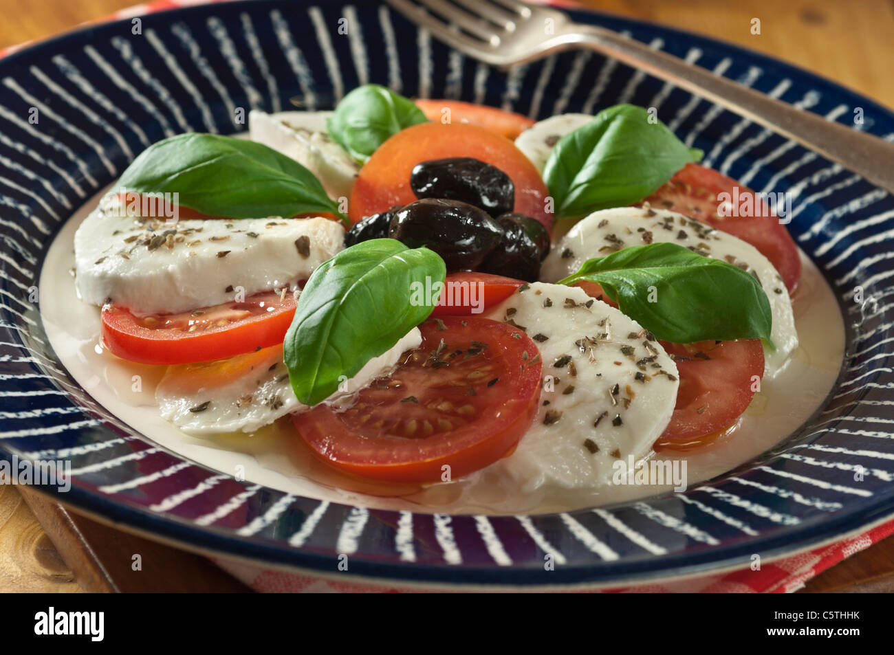Insalata Caprese. Tomato and mozzarella salad Stock Photo - Alamy