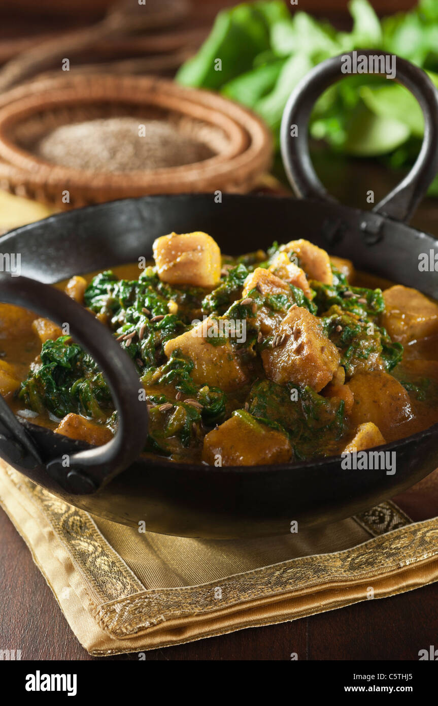 Aloo palak or Aloo sag. Spinach and potato curry Stock Photo